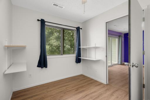Lower level office/playroom/flex space. No closet but could be used as a bedroom.