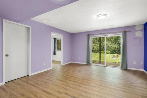 Family room with walkout to private backyard