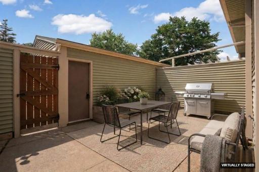 Large enclosed front patio--virtually staged