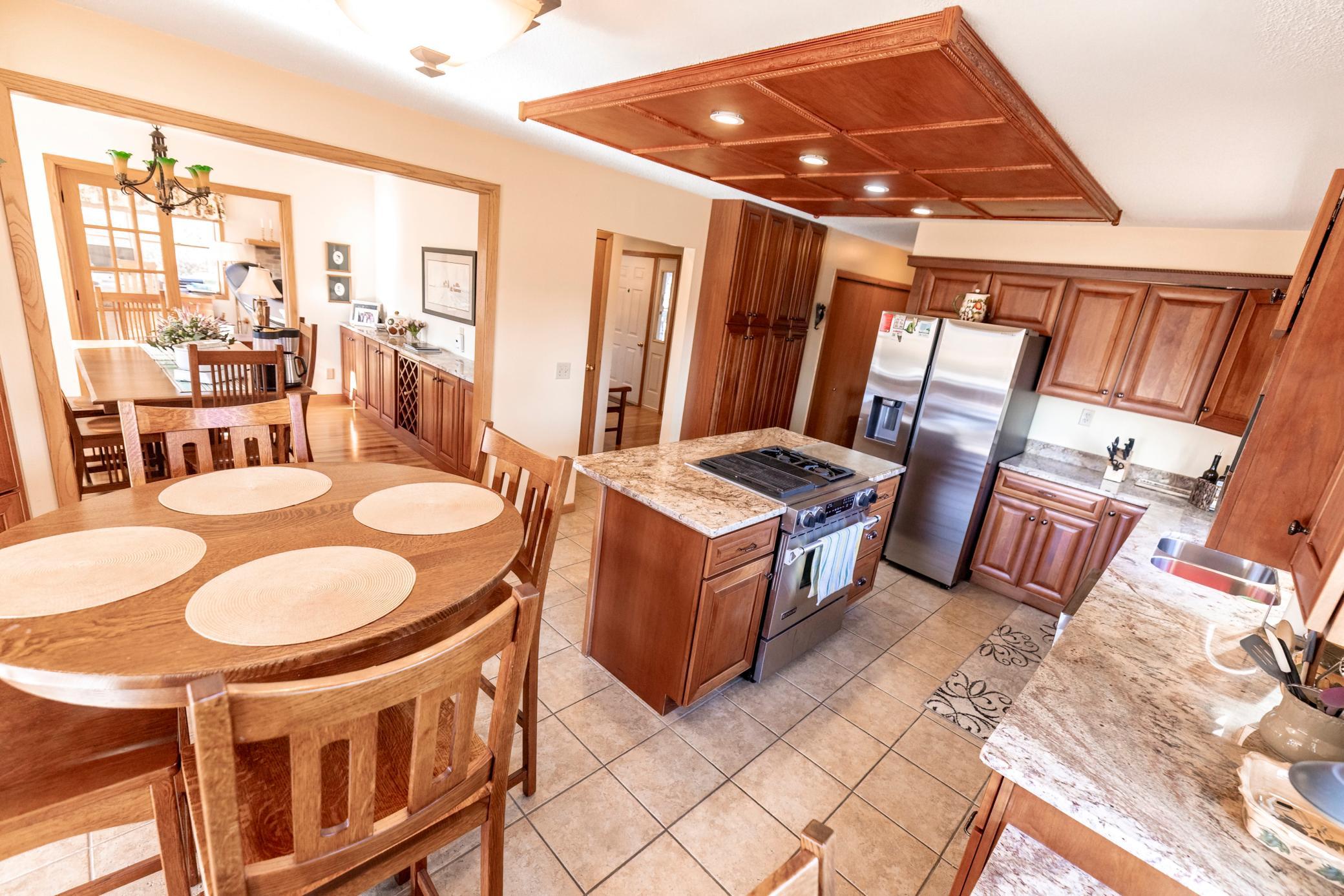 Kitchen opens to formal dining room