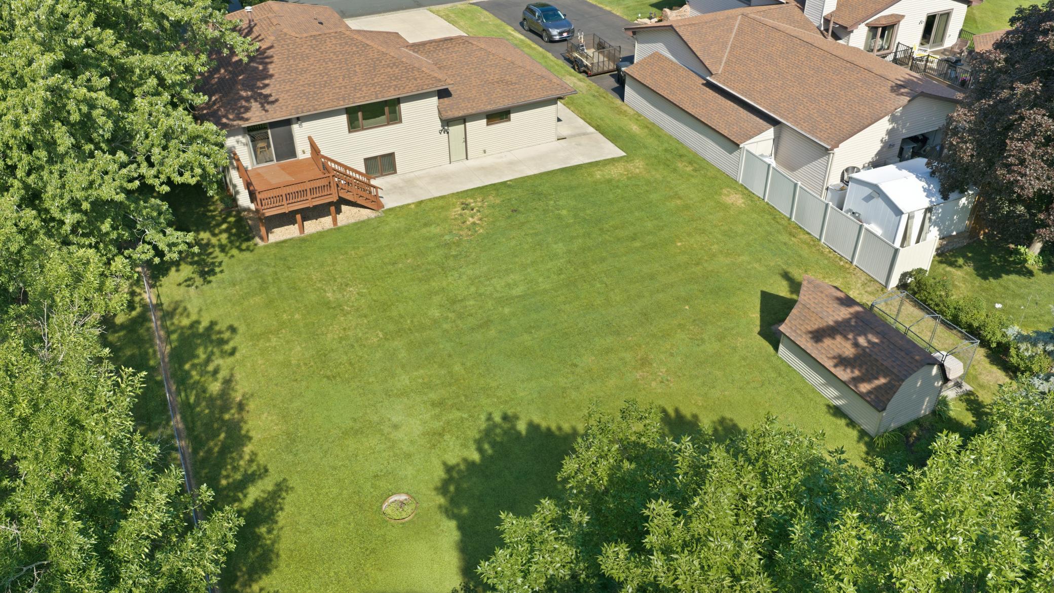 Generously sized new concrete patio & freshly stained deck