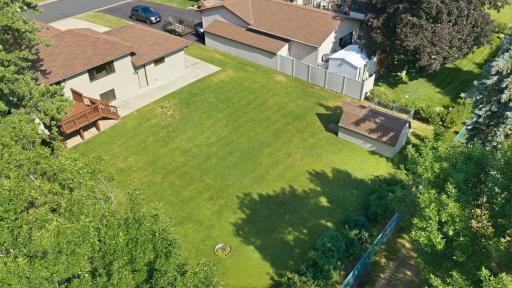 Large backyard with shed
