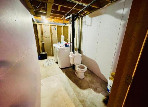 Basement 1/4 bath and laundry area