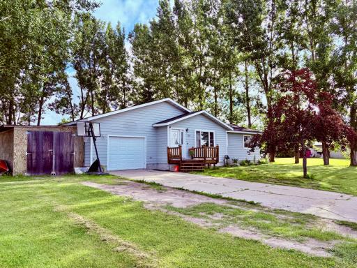 Attached garage and shed