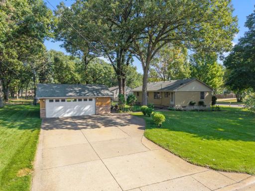 Oversize corner lot with large garage and driveway