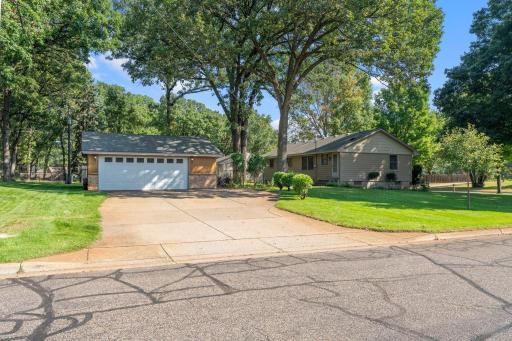 Large two car garage with oversized driveway