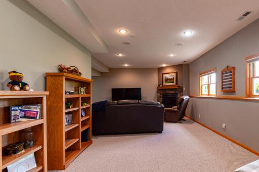 Lower level Amusement room space opens to the Family Room space.jpg