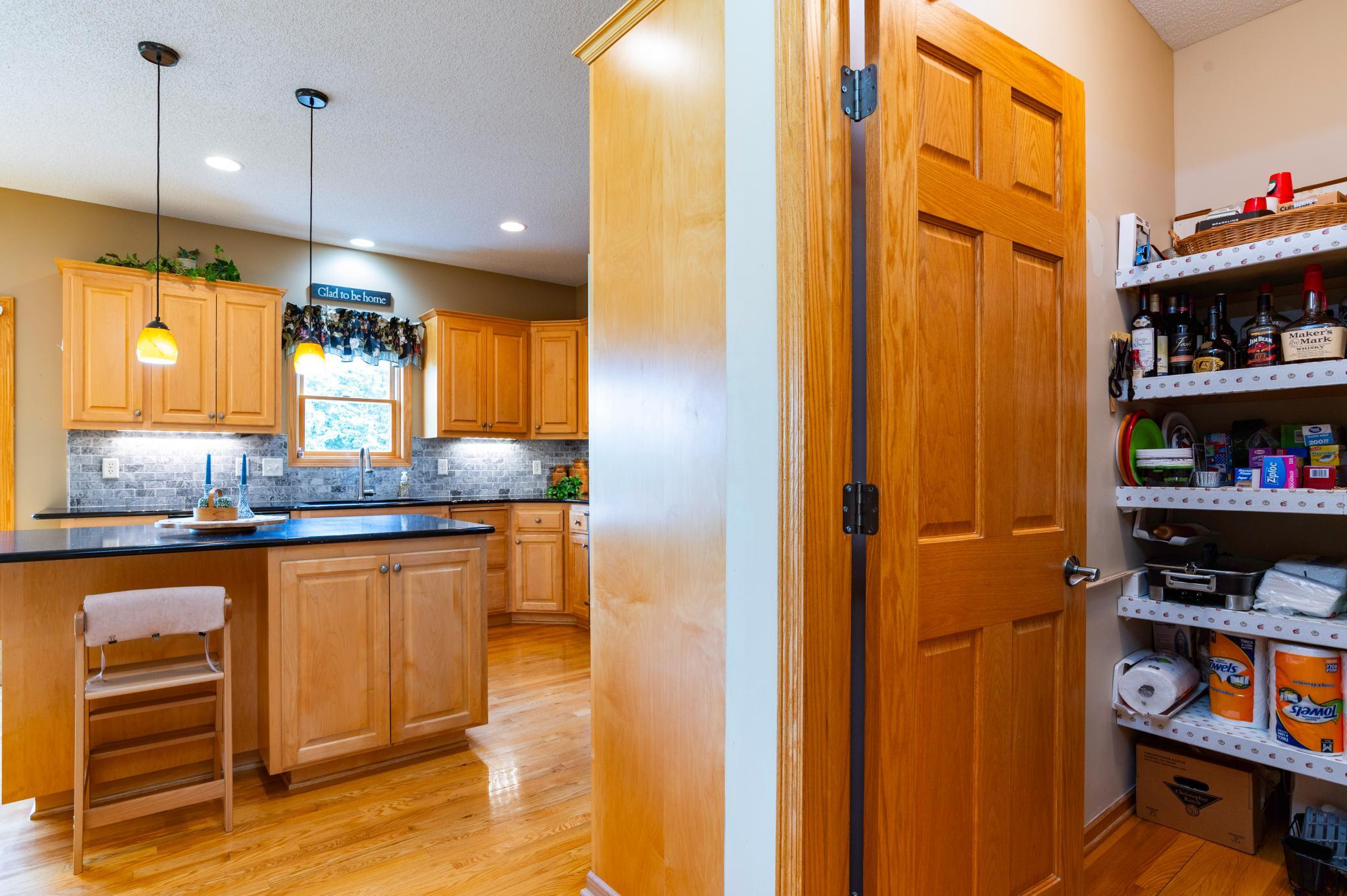 Large pantry provides even more storage off the kitchen.jpg