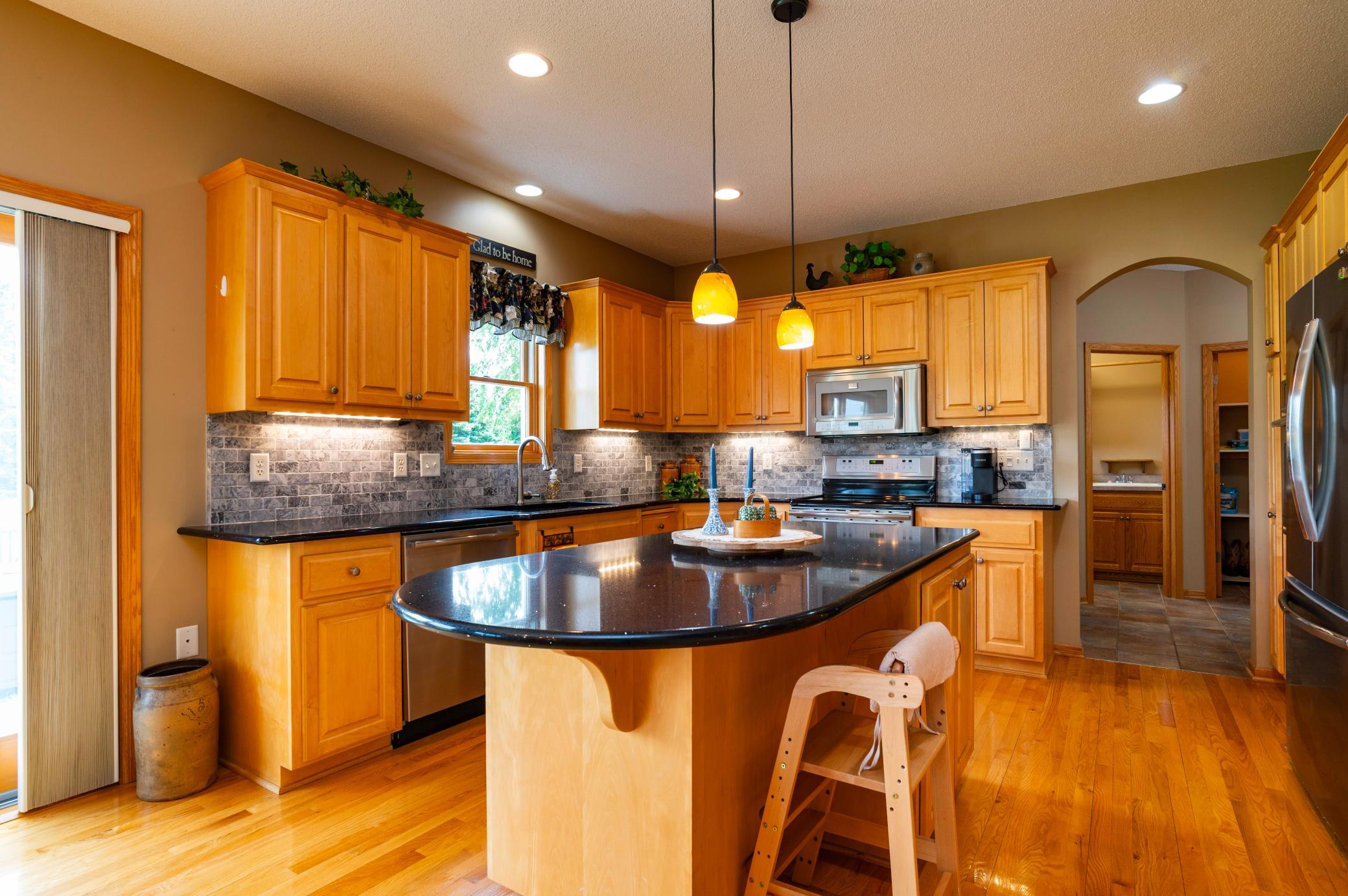 Gorgeous Maple Cabinets provide storage for everything.jpg