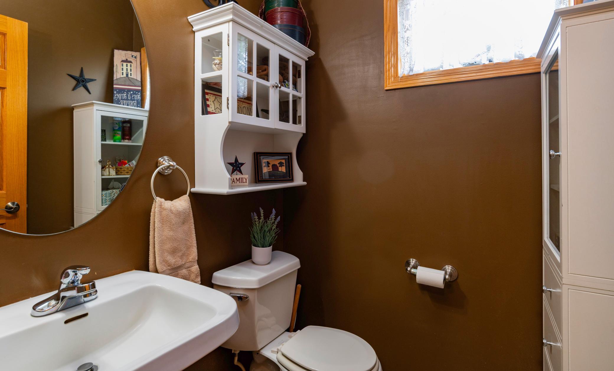 Main level half bath off of mud room.jpg
