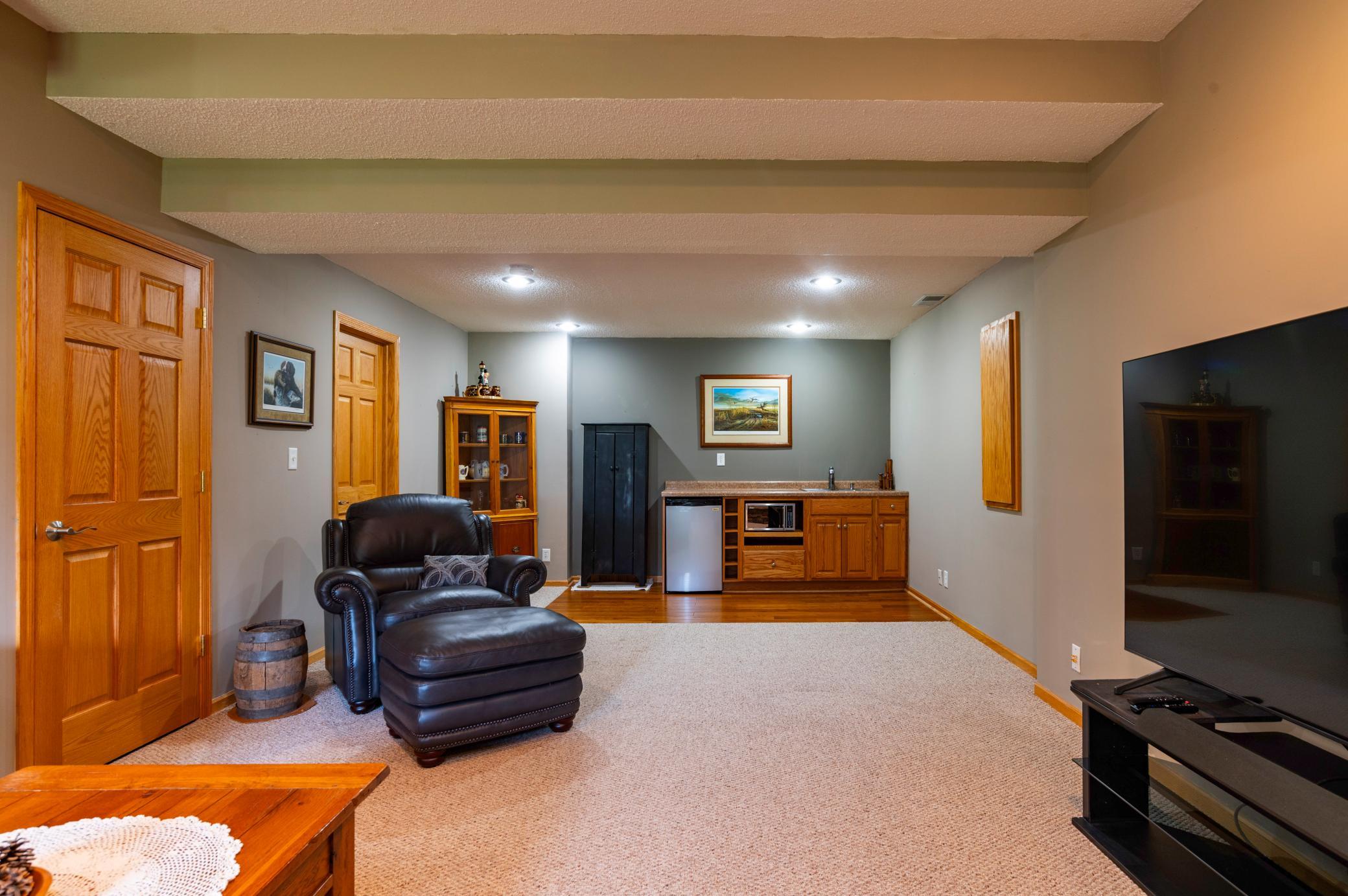 Lower level has storage-mechanicals right off Family Room.jpg