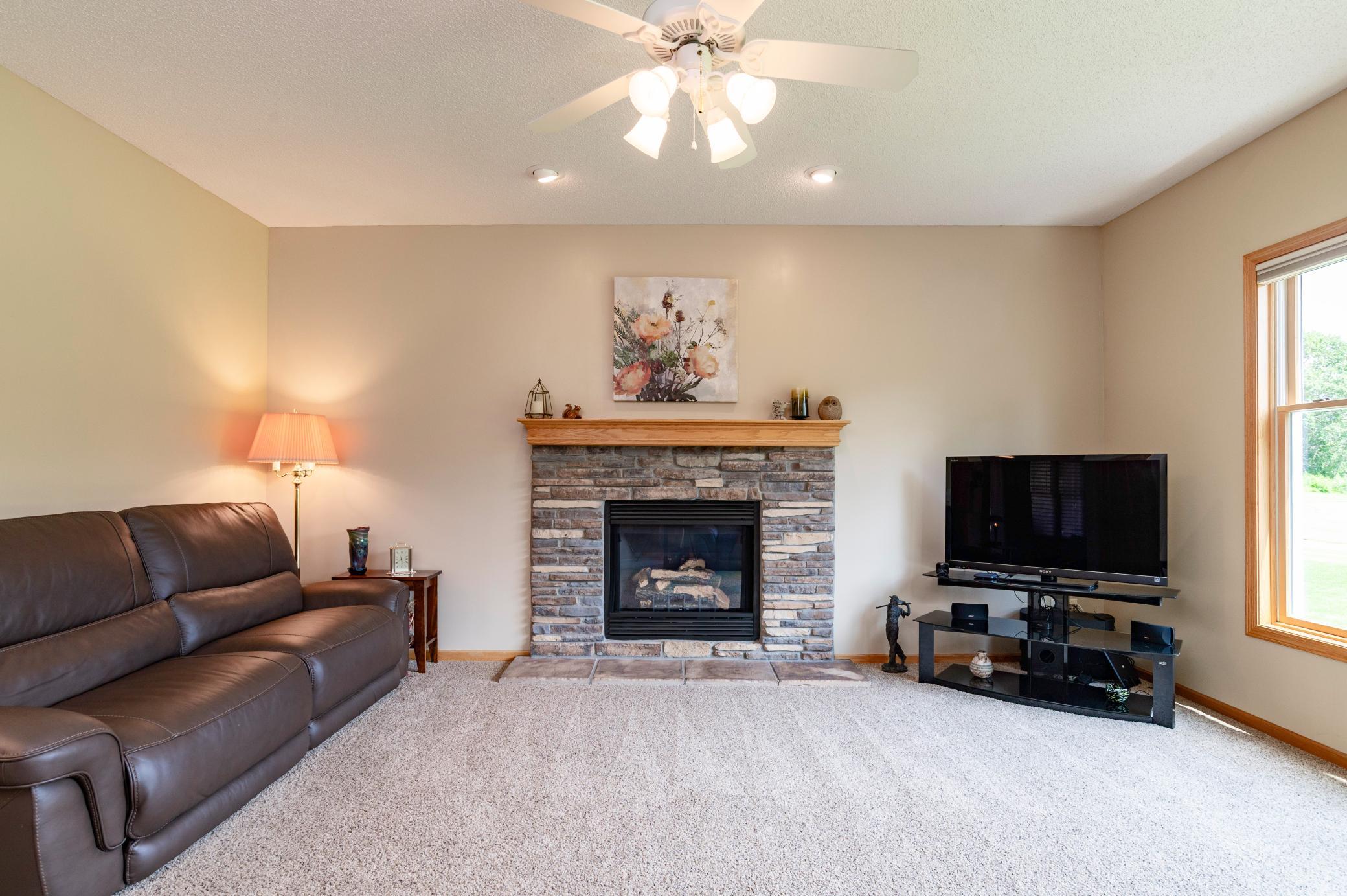 Main level living room with gas burning fireplace.jpg
