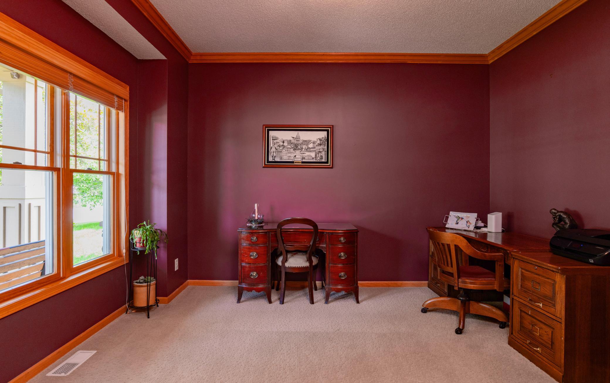 Sunny main level office with french doors makes an easy commute to the golf course.jpg