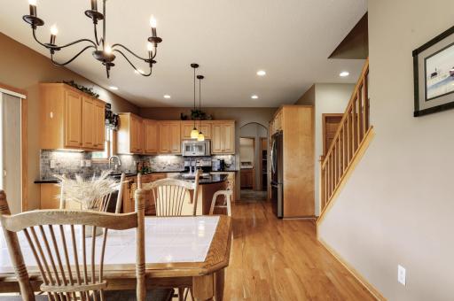 View from main level living room shows the open floorplan and gorgeous floors.jpg