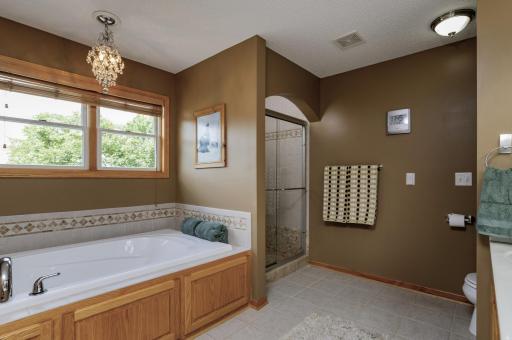 Relax in your jacuzzi tub after playing the course or step into the separate tiled shower.jpg