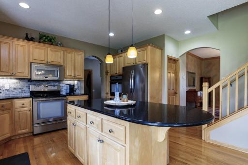 Kitchen is the hub of the home - right off the mud room and formal dining.jpg