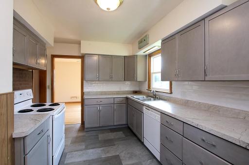 With plenty of counterspace, this kitchen is ready to whip up some delicious meals or tasty baked goods.