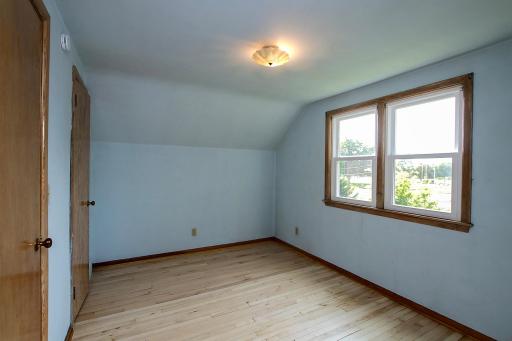 The third bedroom is also located upstairs.