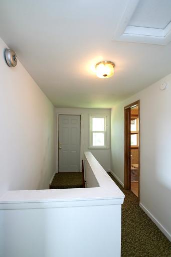 There is a small deck located off the upstairs hallway. All steel entry doors on the home have also been updated.