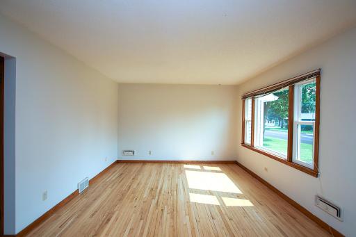 The living room is spacious and the new windows provide tons of natural light.