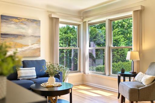 Living room windows flood the room with natural light