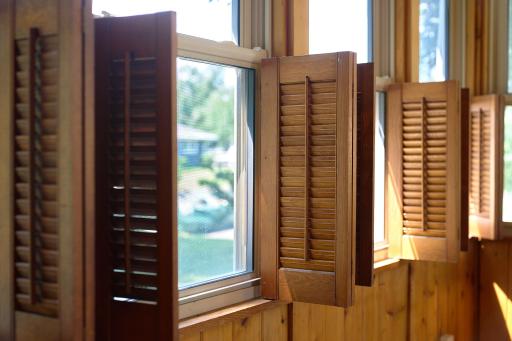 Beautiful shutters provide privacy when closed and welcome natural sunlight when opened.