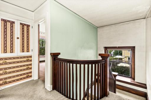Curved Banister with Window Seat on Landing