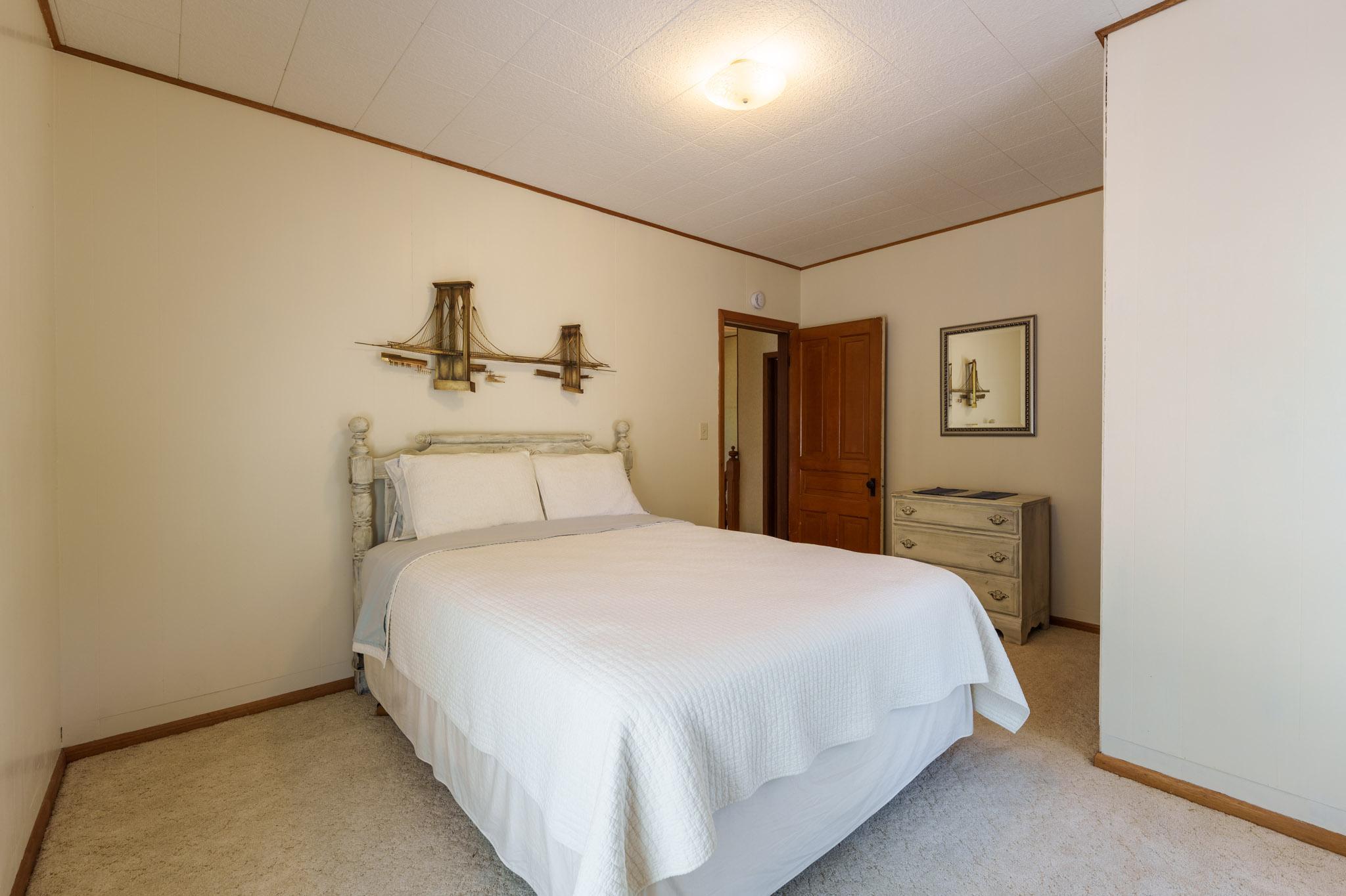 Bedroom One: This is one of three upper-floor bedrooms.