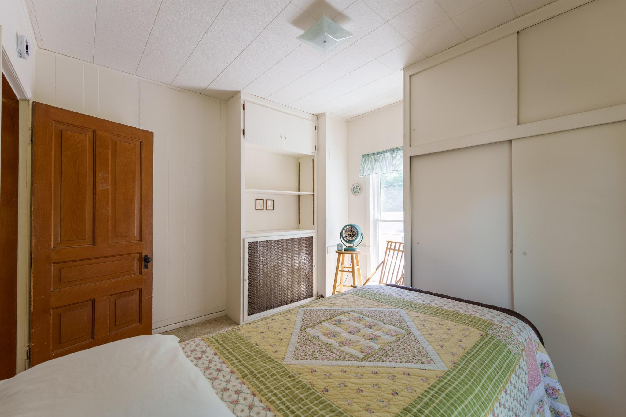 Bedroom Three of three! This bedroom offers generous closet storage and built-in shelves.