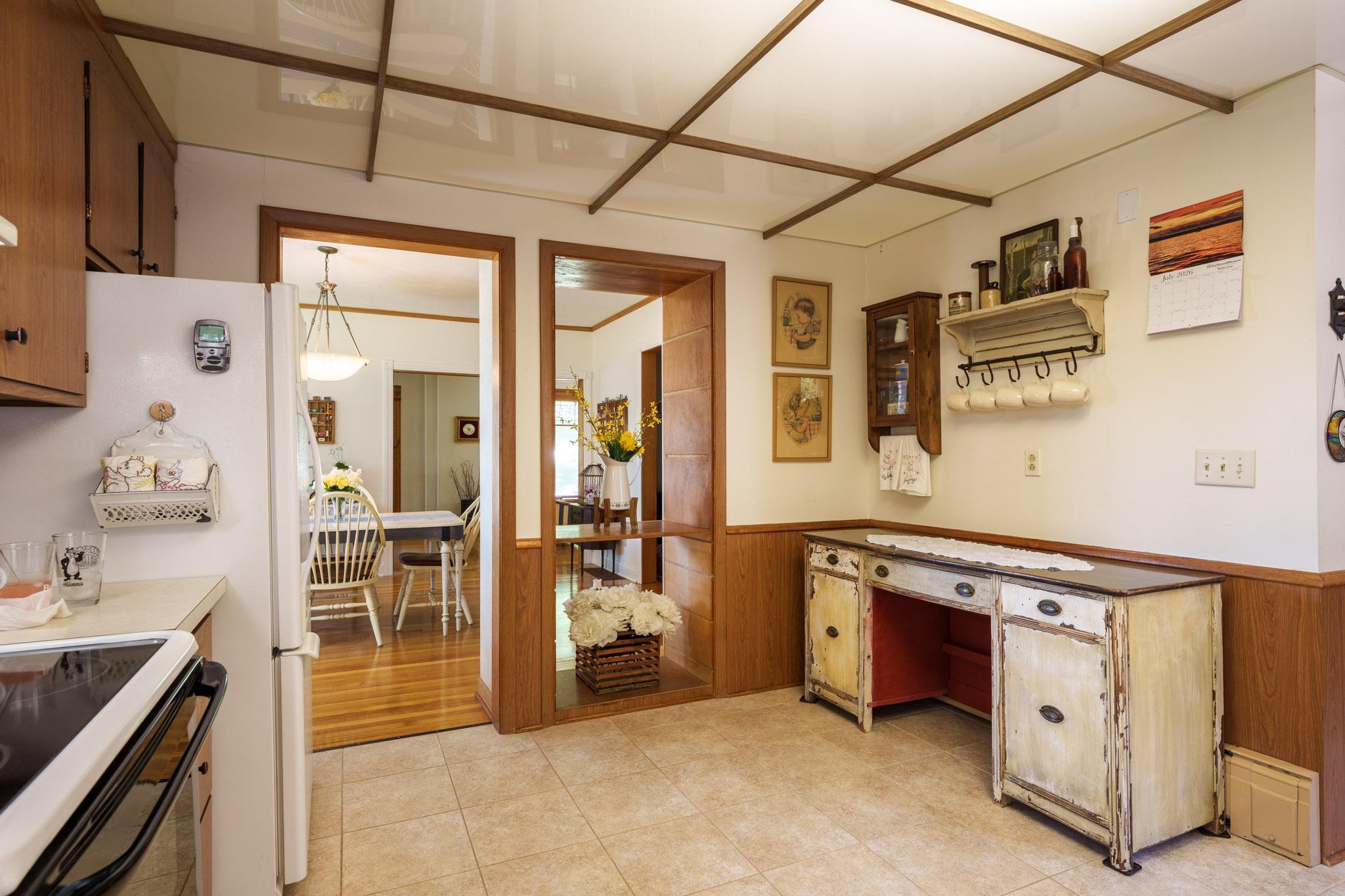 So lovable as it is! However, you might explore installing floor to ceiling cabinets for additional storage, or even opening up the wall between kitchen and dining! So many possibilities await you!