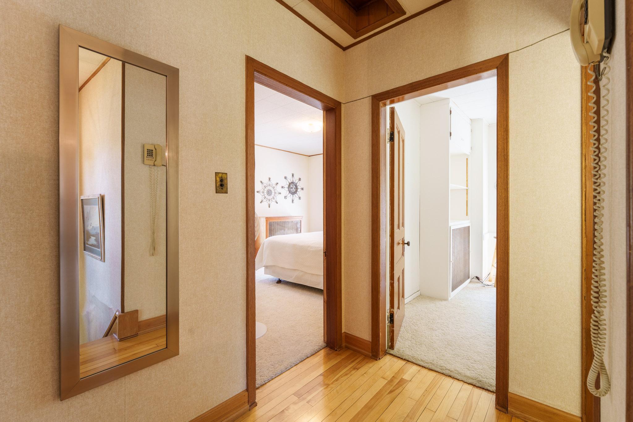 This the landing at the top of the stair to the second floor Three bedrooms and a half-bath.