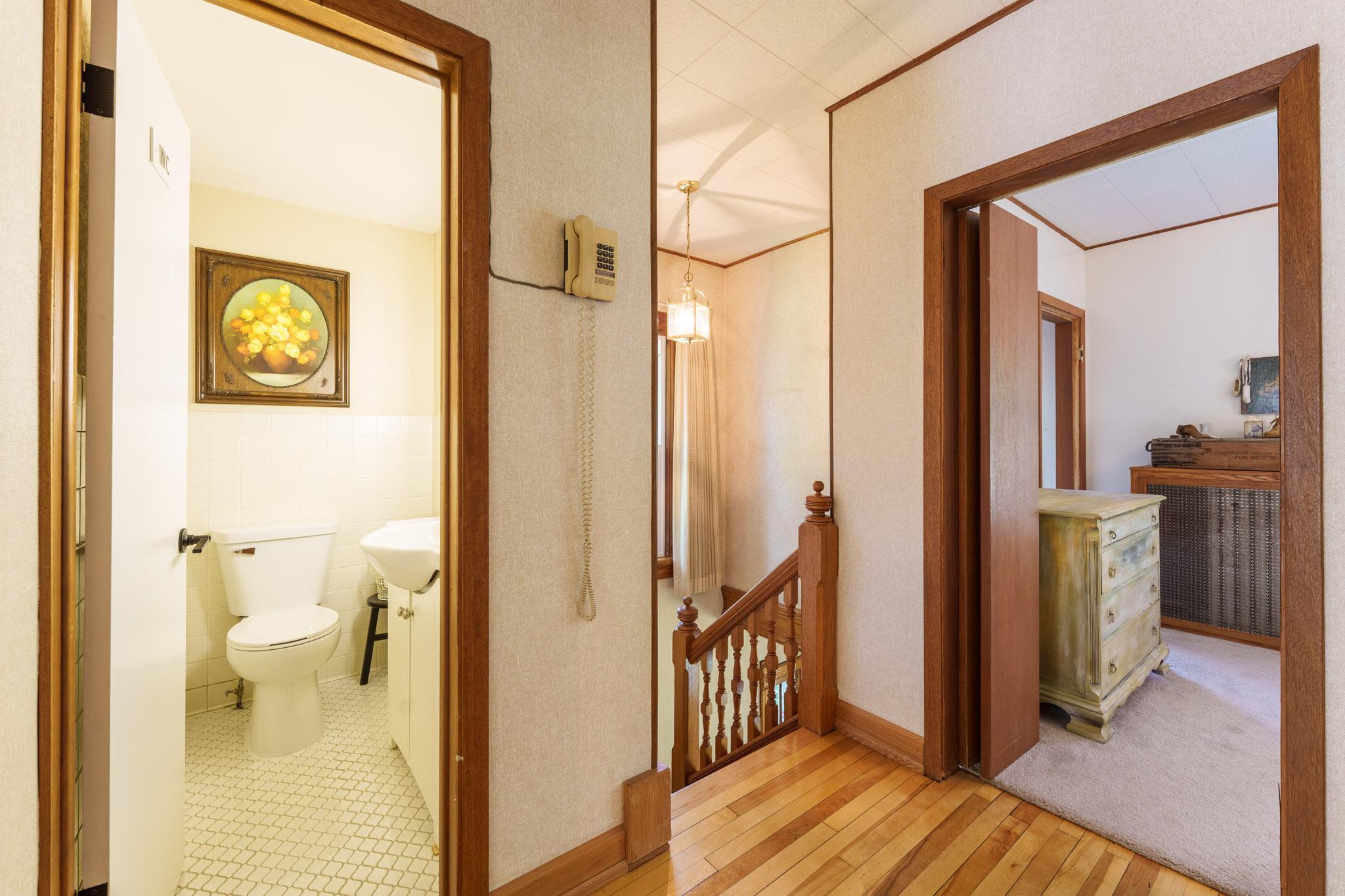 The second floor offers a convenience not often afforded in this age of home : A charming second bathroom. This is a 1/2 Bath .