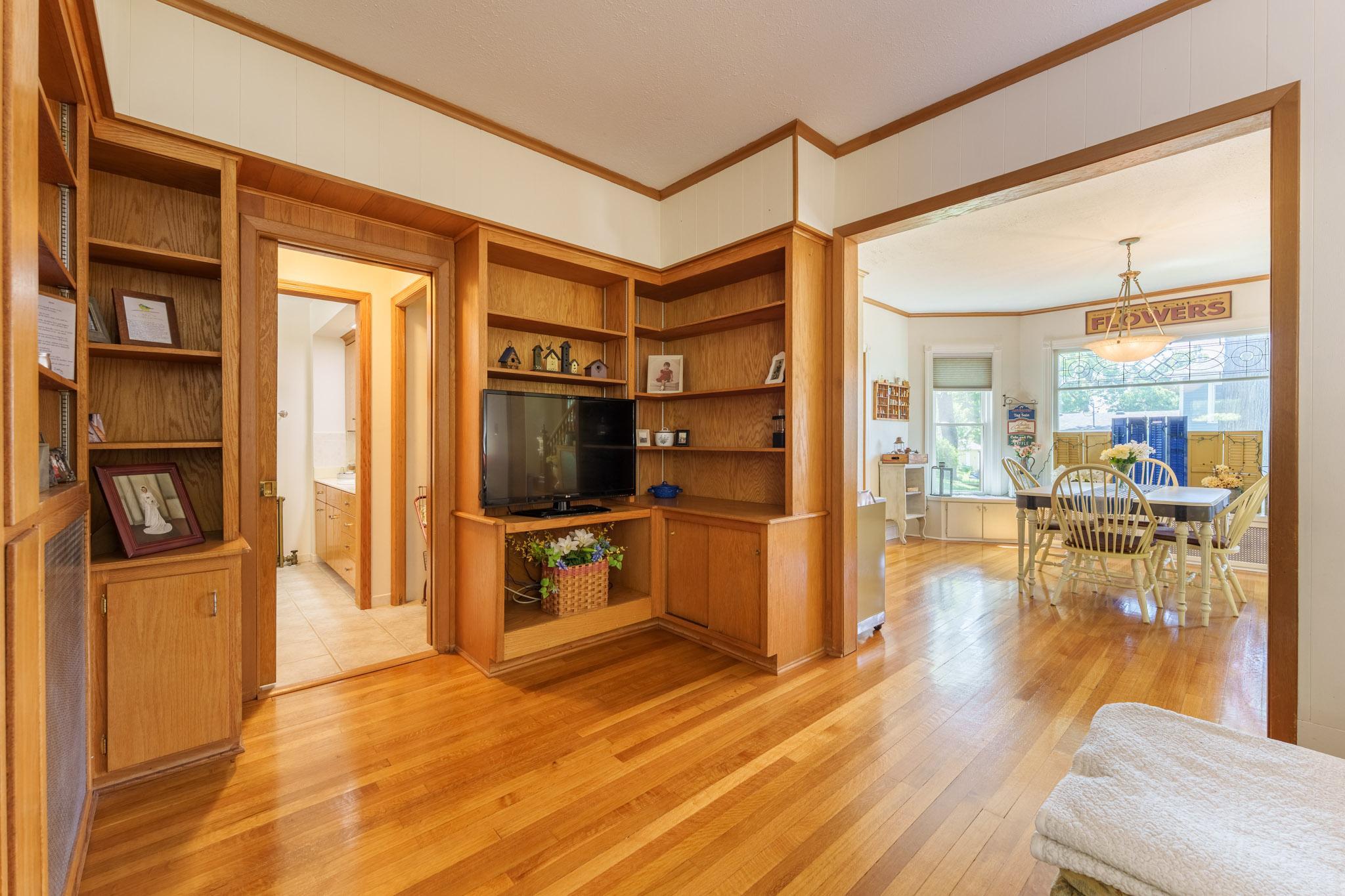 The home library works well as a small tv room! This is perfectly located just off the dining room!