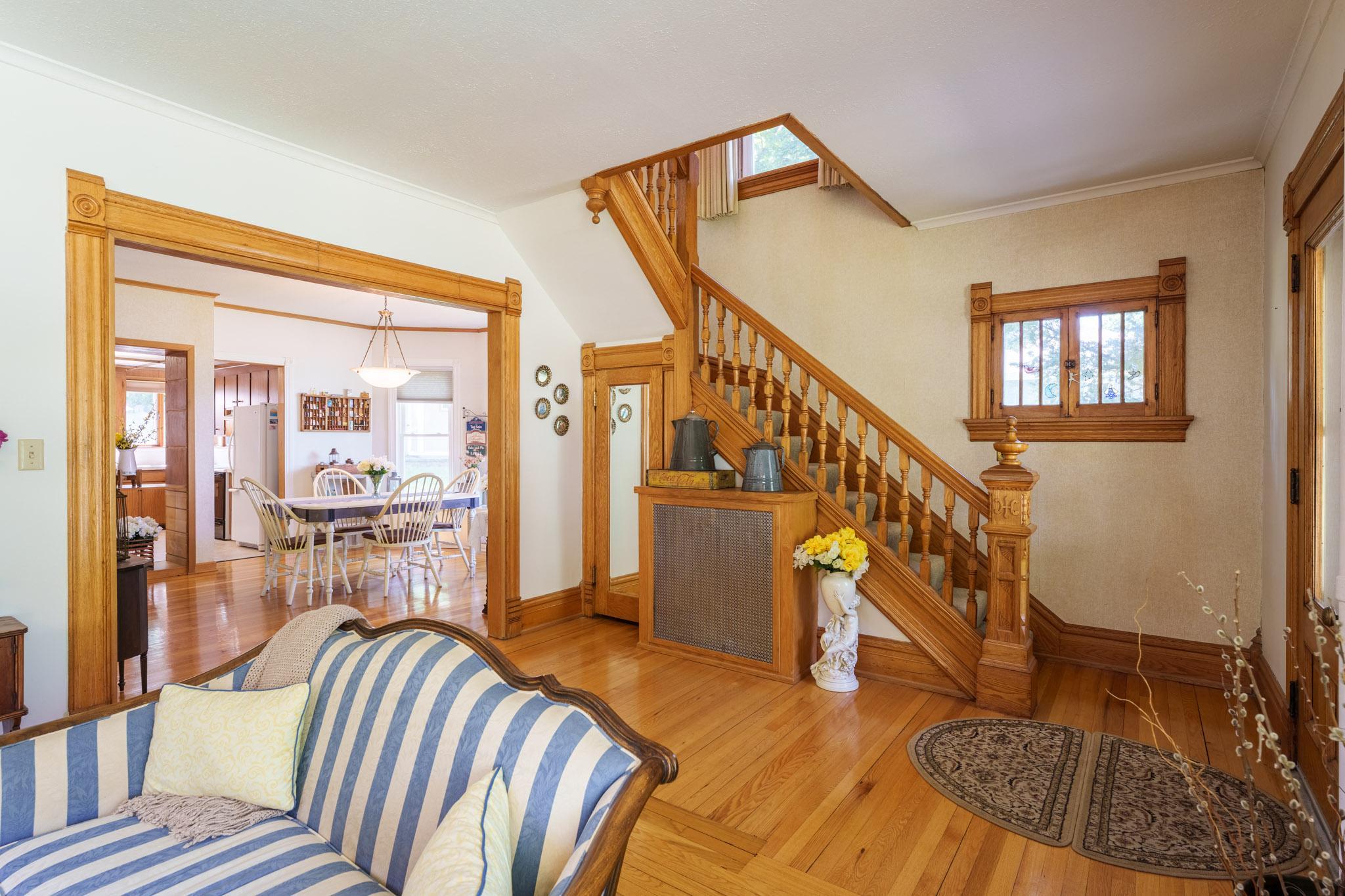 The natural flow from the front sitting room to the dining area is seamless!