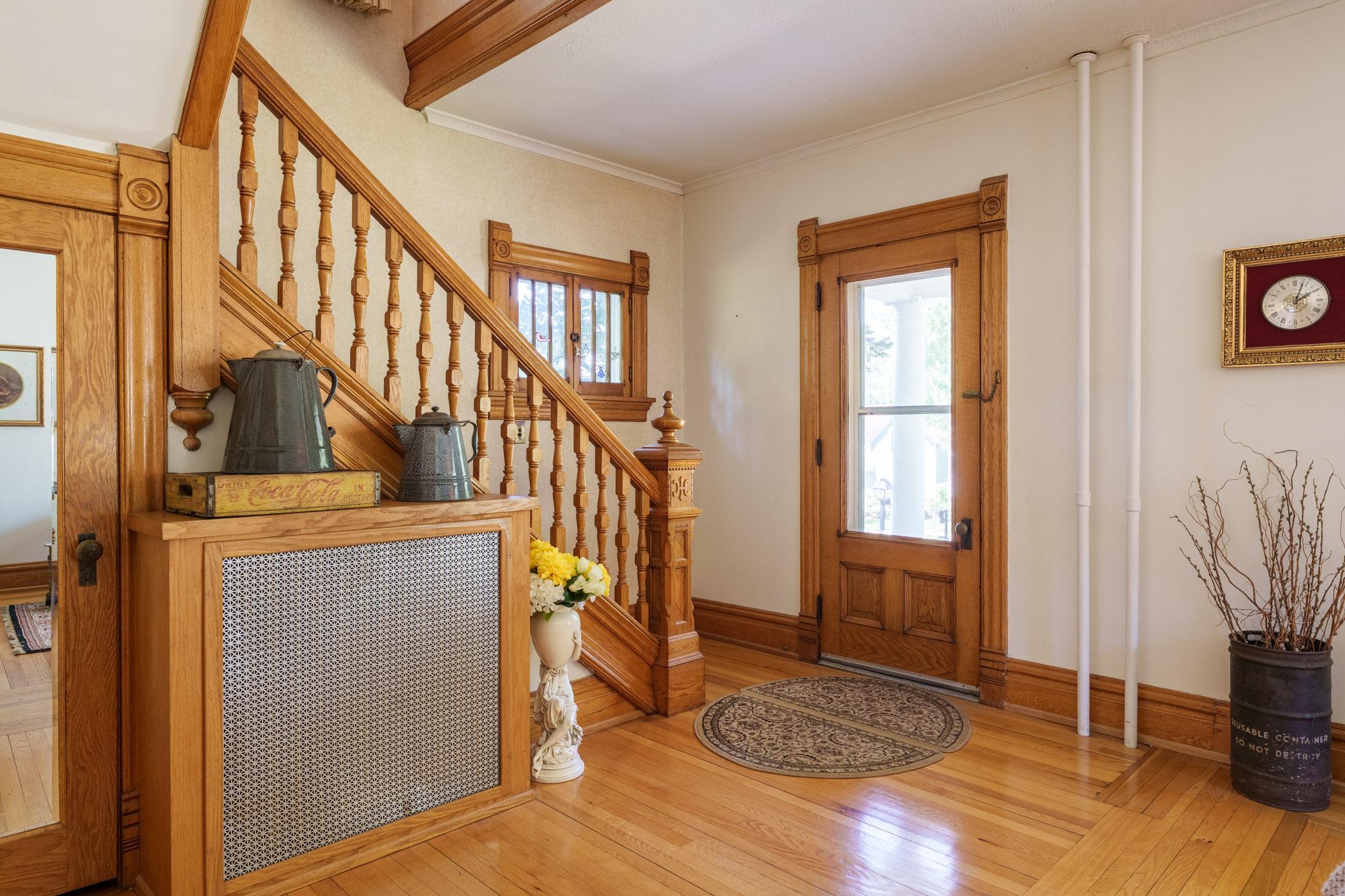 As you enter through the original, wood front door, you are invited to take in the warm charm and character of this wonderful home. If you love older homes, this one will leave you swooning!