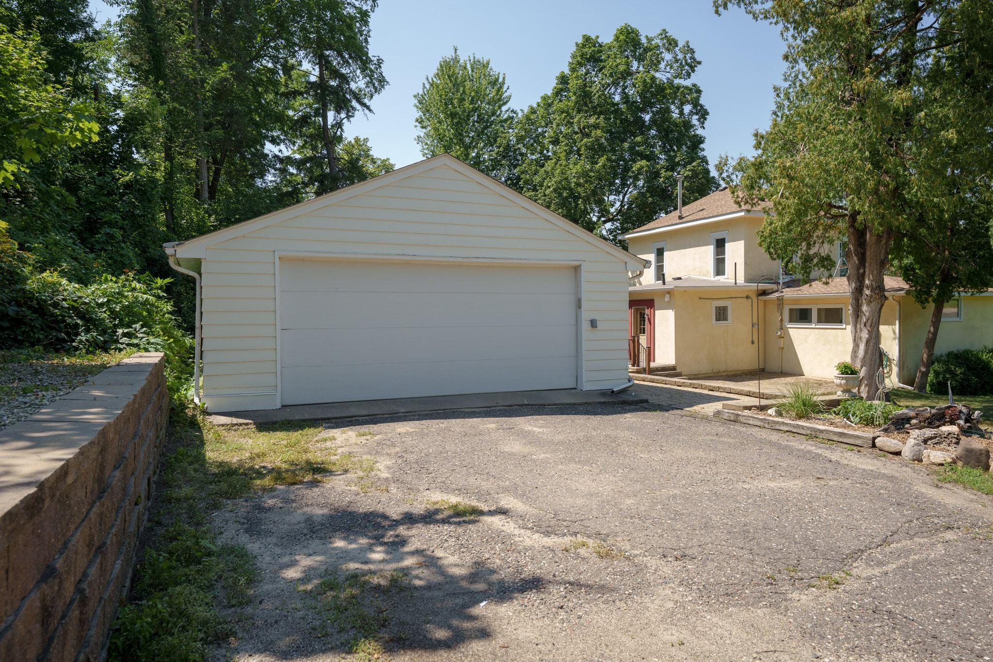 The oversized two-stall garage is deep in length...potential for tandem parking of as many as four smaller vehicles!