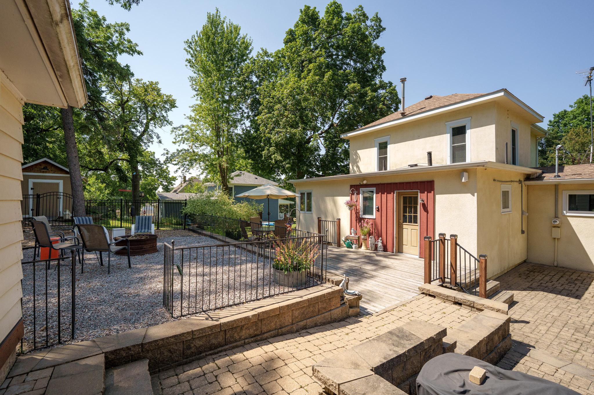 View from garage to the back entrance to the home! Multi-levels of outdoor patio space are to be enjoyed!