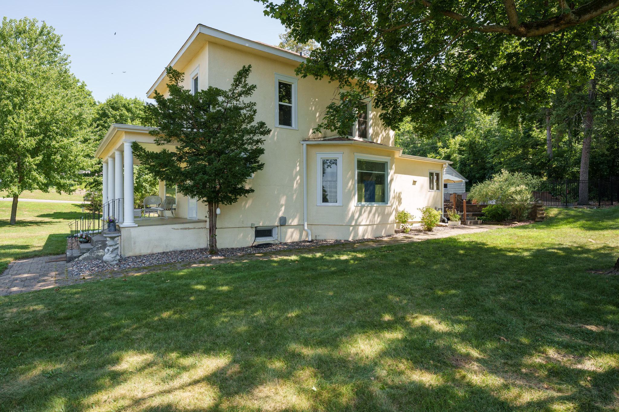 The home has a set-back from neighboring property on all four sides. This is a view of the west-facing side.