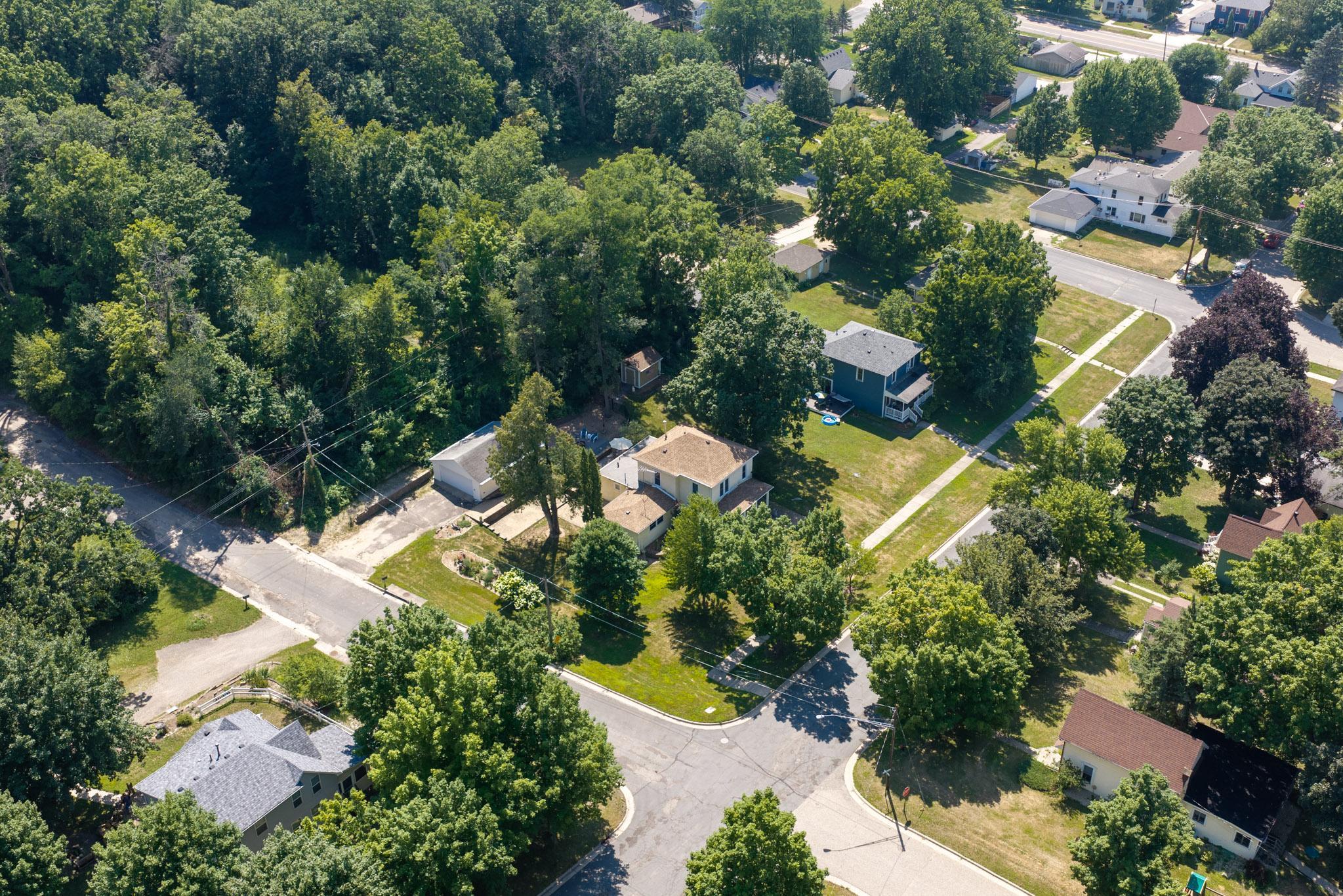Check out the aerial view of this home and note the large corner lot!