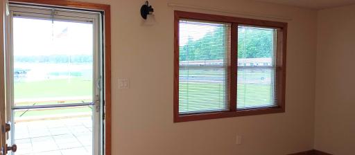 Front window faces Mille Lacs Lake and the heated outdoor pool