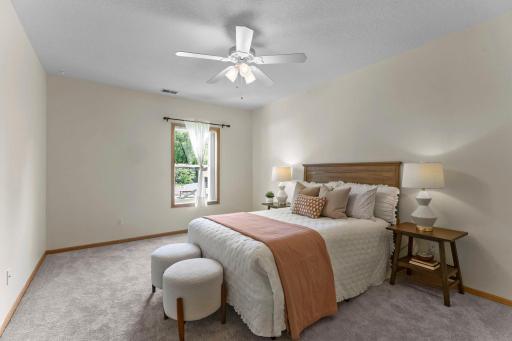 A spacious fifth bedroom with a large walk-in closet on the lower level.