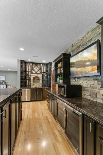 Extensive wine storage and exceptional prep space create an elevated, effortless entertaining experience.