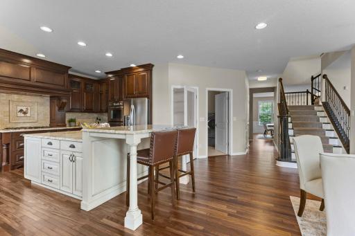 Designed for cooking, entertaining, and gathering, it is the heart of the home.