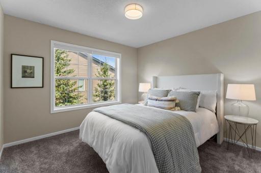 Three additional bedrooms complete the upper level.
