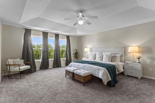 The private primary suite is thoughtfully separated from the other bedrooms.