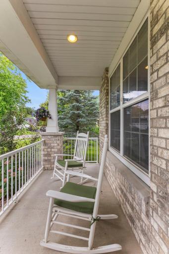 The home also features a welcoming front porch.