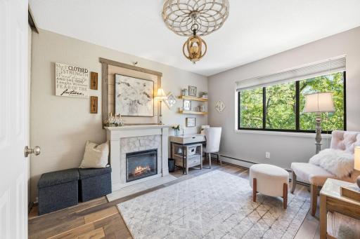 The 2nd bedroom is spacious, bright, and is currently used as an office/sitting room.