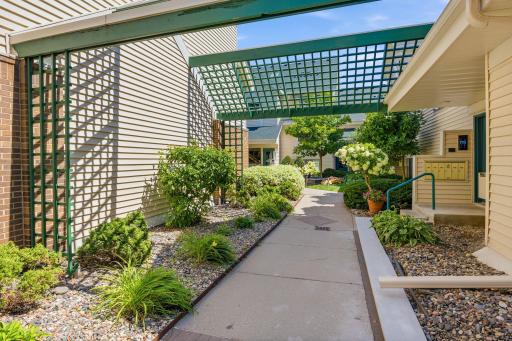 Walkway to the unit is wonderfully maintained by the HOA!