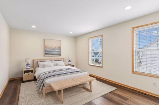 Spacious primary suite. In-ceiling lighting throughout the home provides great lighting. (Virtually Staged
