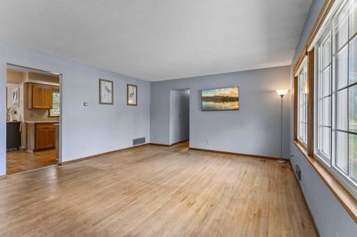 Welcome inside as hardwood floors greet you